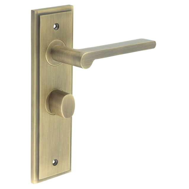 This is an image showing the Frelan - Fitzrovia Door Handle Bathroom Backplate Antique Brass & Turn & Release available to order from Trade Door Handles in Kendal