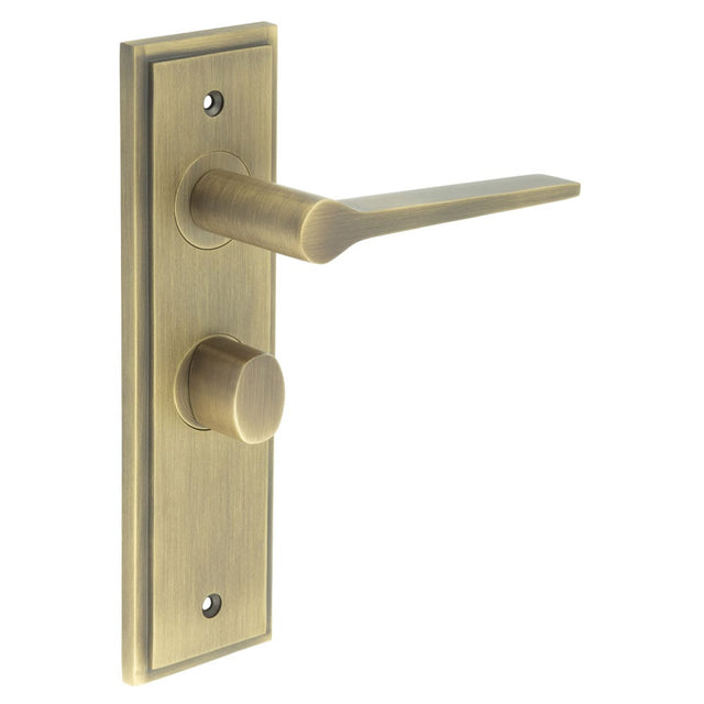 This is an image showing the Frelan - Knightsbridge Door Handle Bathroom Backplate Antique Brass & Turn & Release available to order from Trade Door Handles in Kendal