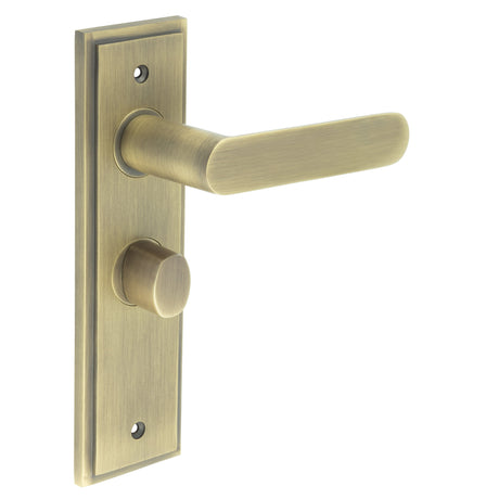 This is an image showing the Frelan - Kensington Door Handle Bathroom Backplate Antique Brass & Turn & Release available to order from Trade Door Handles in Kendal