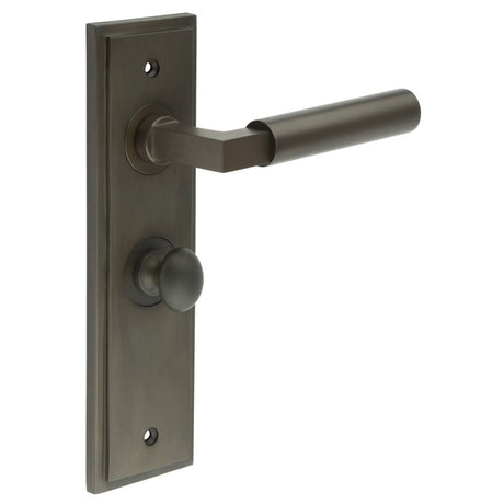 This is an image showing the Frelan - Westminster Door Handle Bathroom Backplate Dark Bronze & Turn & Release available to order from Trade Door Handles in Kendal