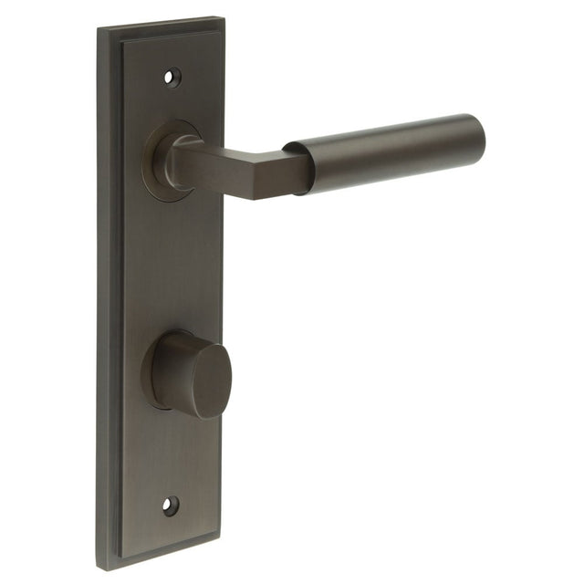 This is an image showing the Frelan - Westminster Door Handle Din Bathroom Backplate Dark Bronze & Turn & Release available to order from Trade Door Handles in Kendal