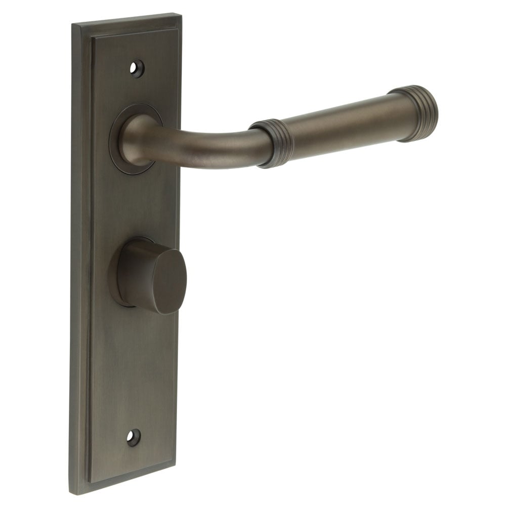 This is an image showing the Frelan - Highgate Door Handle Bathroom Backplate Dark Bronze & Turn & Release available to order from Trade Door Handles in Kendal