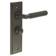 This is an image showing the Frelan - Piccadilly Door Handle Bathroom Backplate Dark Bronze & Turn & Release available to order from Trade Door Handles in Kendal