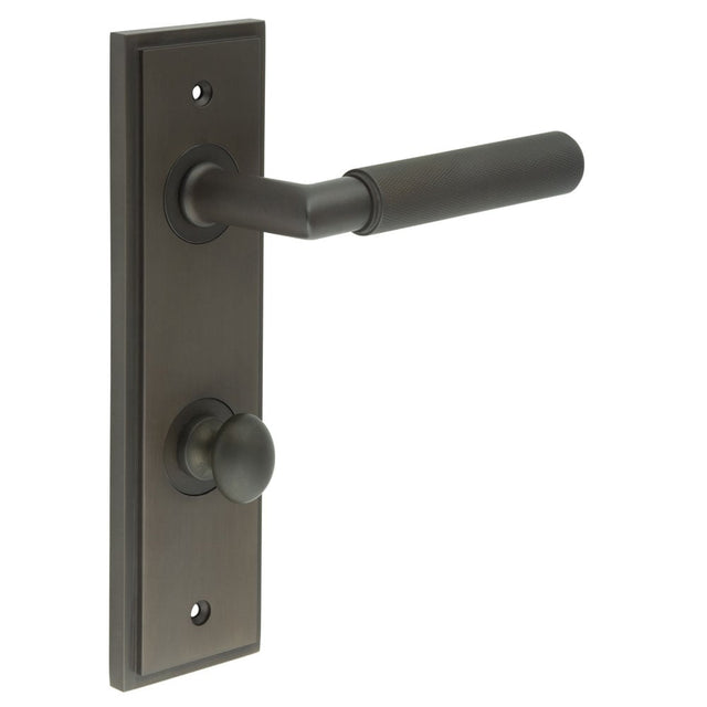 This is an image showing the Frelan - Piccadilly Door Handle Din Bathroom Backplate Dark Bronze & Turn & Release available to order from Trade Door Handles in Kendal