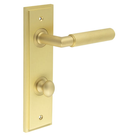 This is an image showing the Frelan - Piccadilly Door Handle Bathroom Din Backplate Satin Brass & Turn & Release available to order from Trade Door Handles in Kendal