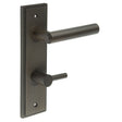 This is an image showing the Frelan - Richmond Door Handle Din Bathroom Backplate Dark Bronze & Turn & Release available to order from Trade Door Handles in Kendal