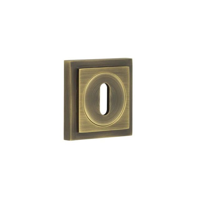 High quality image of Burlington - Standard Keyway Escutcheons Square Stepped Rose Antique Brass Sku. BUR-60AB-173AB