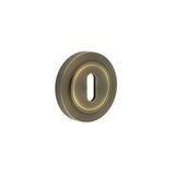 High quality image of Burlington - Standard Keyway Escutcheons Plain Rose Antique Brass Sku. BUR-60AB-71AB