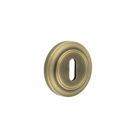 High quality image of Burlington - Standard Keyway Escutcheons Chamfered Rose Antique Brass Sku. BUR-60AB-72AB