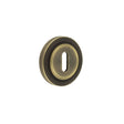 High quality image of Burlington - Standard Keyway Escutcheons Reeded Rose Antique Brass Sku. BUR-60AB-74AB