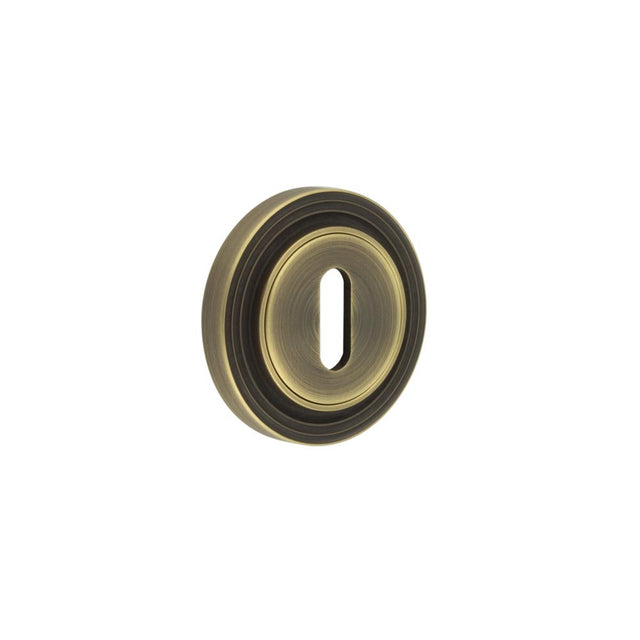 High quality image of Burlington - Standard Keyway Escutcheons Reeded Rose Antique Brass Sku. BUR-60AB-74AB