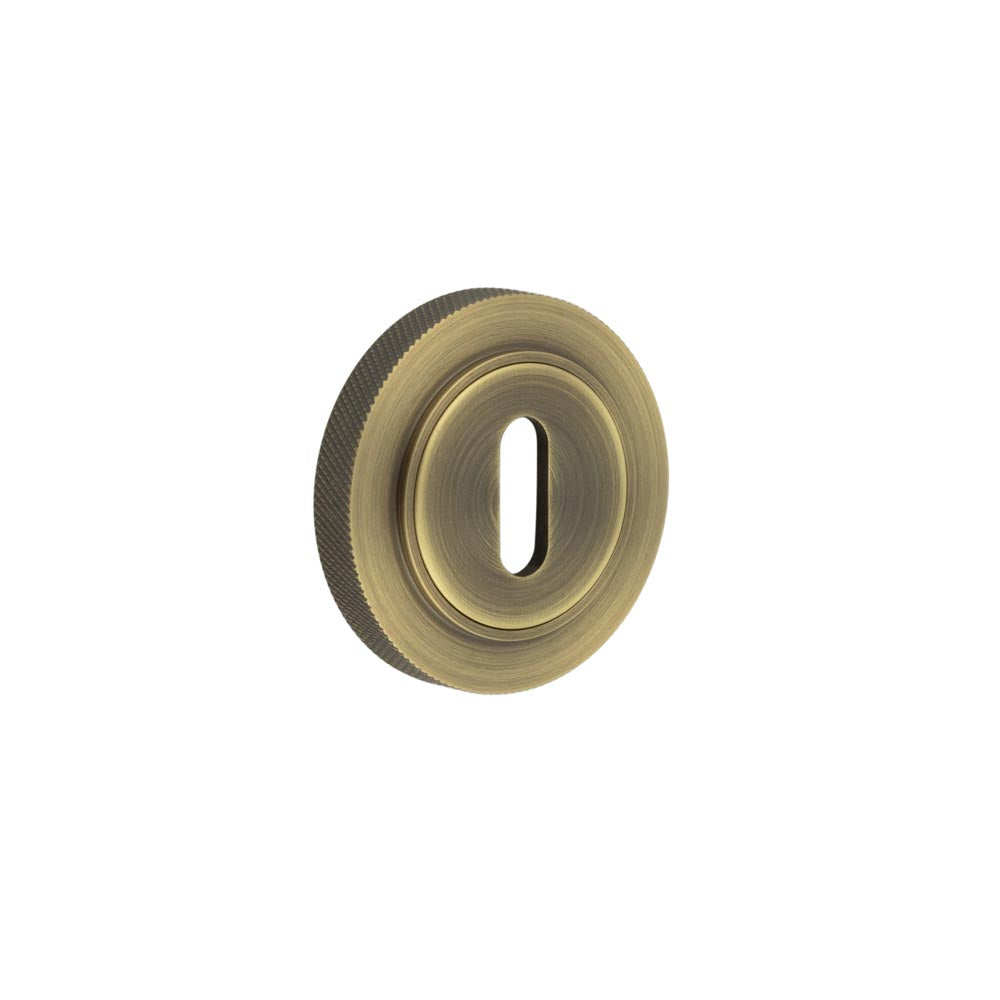 High quality image of Burlington - Standard Keyway Escutcheons Knurled Rose Antique Brass Sku. BUR-60AB-75AB