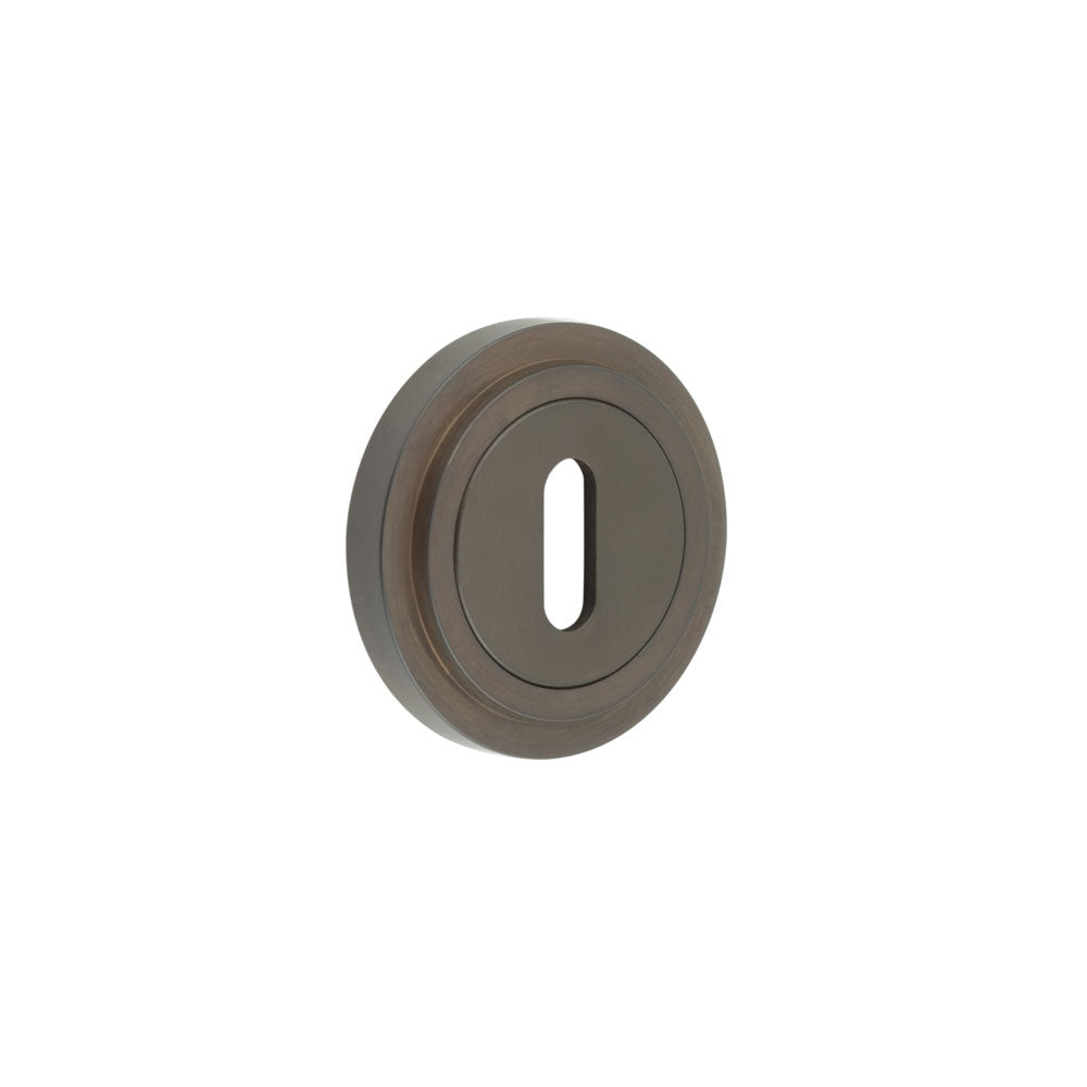 High quality image of Burlington - Standard Keyway Escutcheons Stepped Rose Dark Bronze Sku. BUR-60DB-73DB