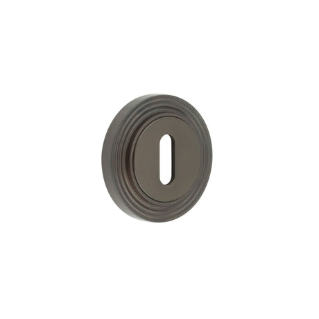 High quality image of Burlington - Standard Keyway Escutcheons Reeded Rose Dark Bronze Sku. BUR-60DB-74DB