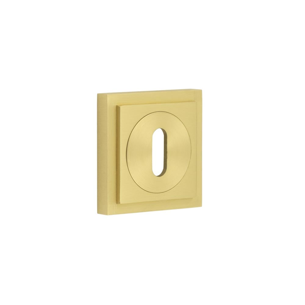 This is an image showing the Frelan - Burlington Standard Keyway Escutcheons Square Stepped Rose Satin Brass available to order from Trade Door Handles in Kendal