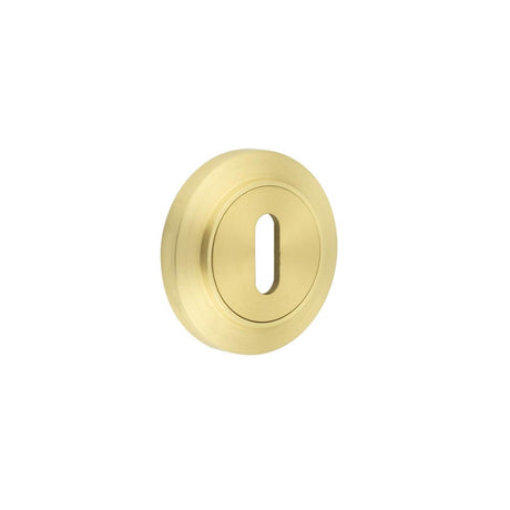 This is an image showing the Frelan - Burlington Standard Keyway Escutcheons Chamfered Rose Satin Brass available to order from Trade Door Handles in Kendal