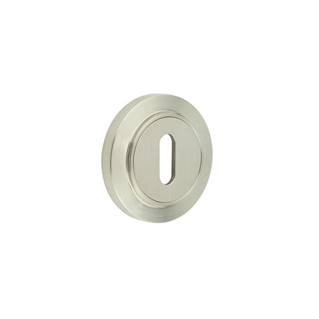 This is an image showing the Frelan - Burlington Standard Keyway Escutcheons Chamfered Rose Satin Nickel available to order from Trade Door Handles in Kendal