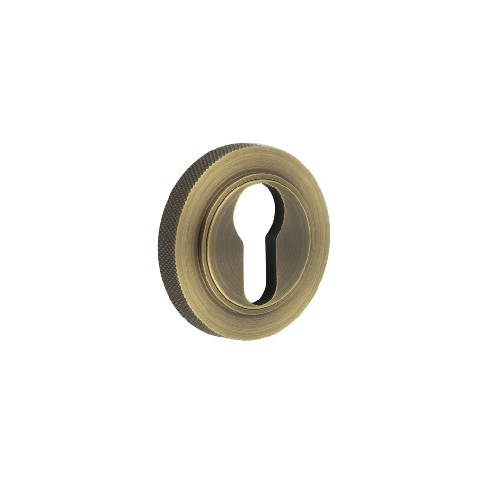 High quality image of Burlington - Euro Profile Escutcheons Knurled Rose Antique Brass Sku. BUR-61AB-75AB