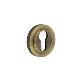 High quality image of Burlington - Euro Profile Escutcheons Knurled Rose Antique Brass Sku. BUR-61AB-75AB