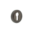 High quality image of Burlington - Euro Profile Escutcheons Reeded Rose Dark Bronze Sku. BUR-61DB-74DB
