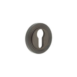 High quality image of Burlington - Euro Profile Escutcheons Reeded Rose Dark Bronze Sku. BUR-61DB-74DB
