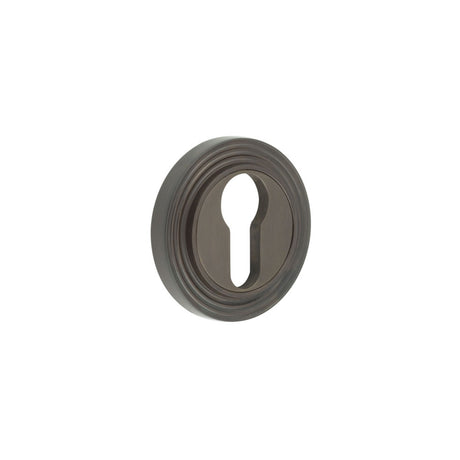 High quality image of Burlington - Euro Profile Escutcheons Reeded Rose Dark Bronze Sku. BUR-61DB-74DB