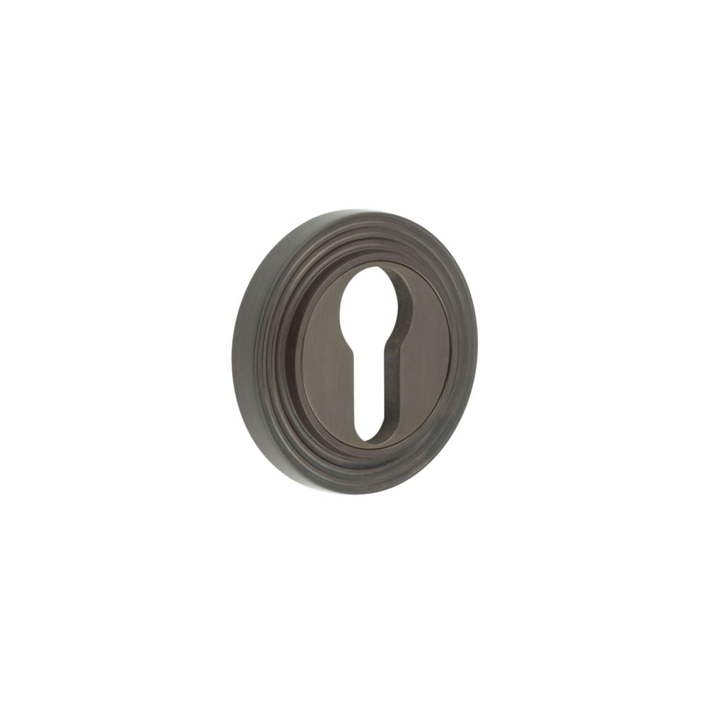 This is an image showing the Frelan - Burlington Euro Profile Escutcheons Reeded Rose Dark Bronze available to order from Trade Door Handles in Kendal