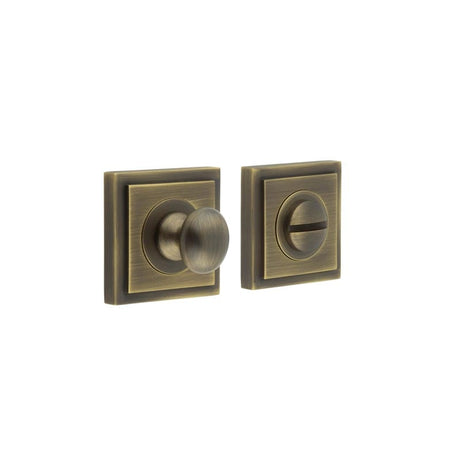 This is an image showing the Frelan - Burlington Turns & Releases Inner 1 Square Stepped Rose Antique Brass available to order from Trade Door Handles in Kendal