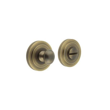 This is an image showing the Frelan - Burlington Turns & Releases Inner 1 Stepped Rose Antique Brass available to order from Trade Door Handles in Kendal