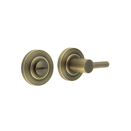 This is an image showing the Frelan - Burlington Easy Turn & Release Reeded Rose Antique Brass available to order from Trade Door Handles in Kendal