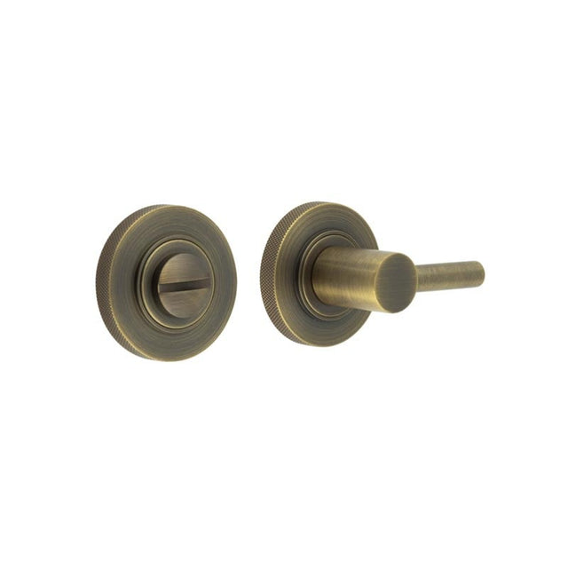 This is an image showing the Frelan - Burlington Easy Turn & Release Knurled Rose Antique Brass available to order from Trade Door Handles in Kendal