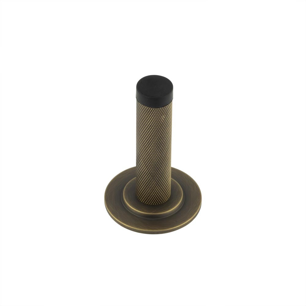 High quality image of Burlington - Knurled Wall Mounted Doorstops Stepped Rose Antique Brass Sku. BUR-968AB-973AB