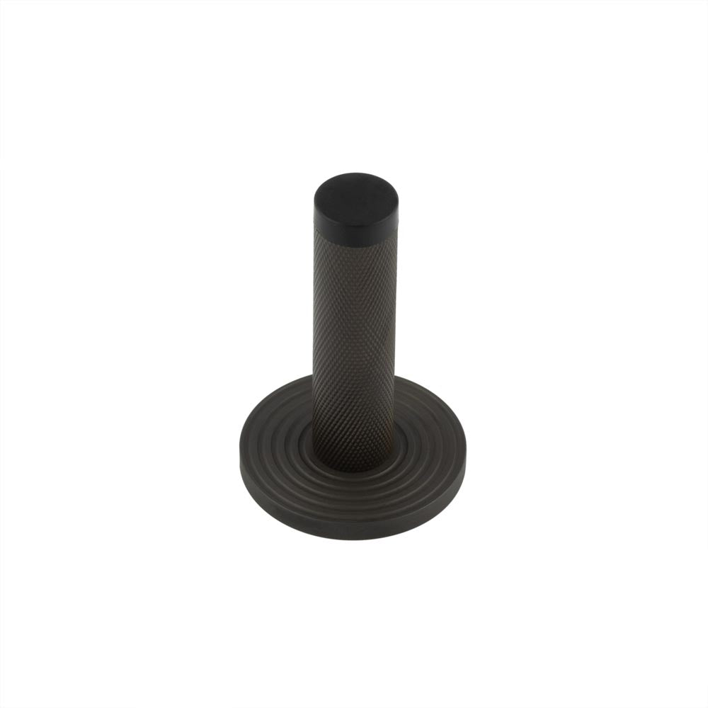 High quality image of Burlington - Knurled Wall Mounted Doorstops Reeded Rose Dark Bronze Sku. BUR-968DB-974DB