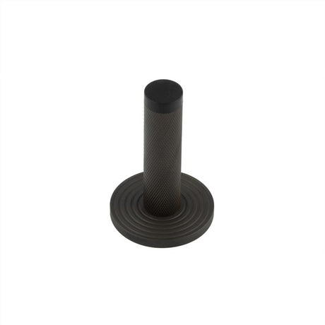 High quality image of Burlington - Knurled Wall Mounted Doorstops Reeded Rose Dark Bronze Sku. BUR-968DB-974DB