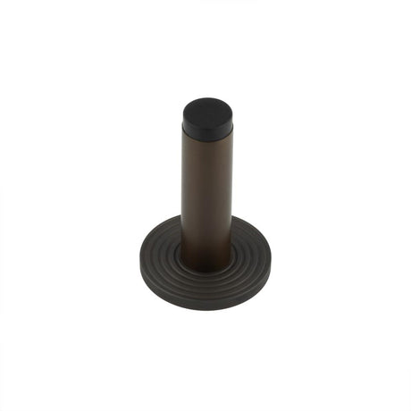 This is an image showing the Frelan - Burlington Plain Wall Mounted Door Stops Reeded Rose Dark Bronze available to order from Trade Door Handles in Kendal