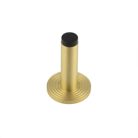 This is an image showing the Frelan - Burlington Plain Wall Mounted Door Stops Reeded Rose Satin Brass available to order from Trade Door Handles in Kendal