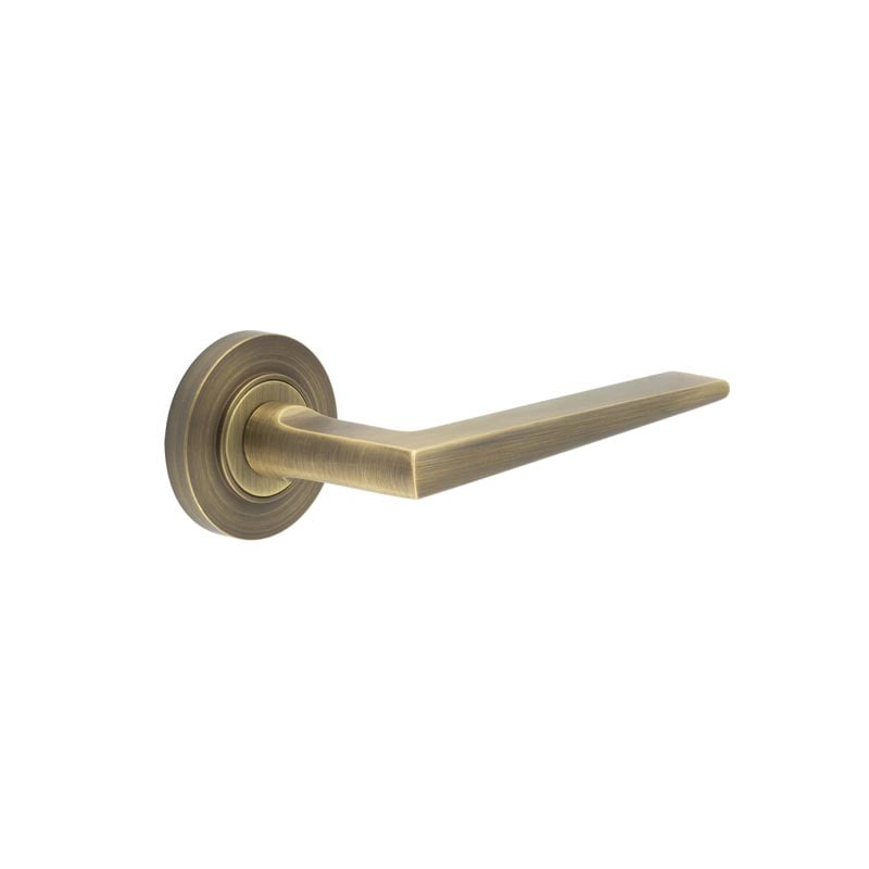 This is an image showing the Frelan - Mayfair Door Handle on Plain Rose Antique Brass available to order from Trade Door Handles in Kendal