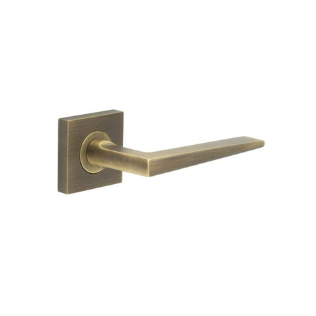 This is an image showing the Frelan - Mayfair Door Handle on Square Plain Rose Antique Brass available to order from Trade Door Handles in Kendal