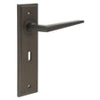 This is an image showing the Frelan - Mayfair Door Handle Lock Backplate Dark Bronze available to order from Trade Door Handles in Kendal