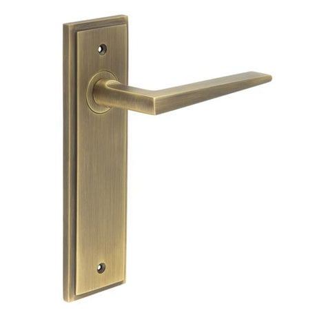 This is an image showing the Frelan - Mayfair Door Handle Latch Backplate Antique Brass available to order from Trade Door Handles in Kendal