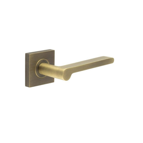 This is an image showing the Frelan - Fitzrovia Door Handles Square Plain Rose Antique Brass available to order from Trade Door Handles in Kendal