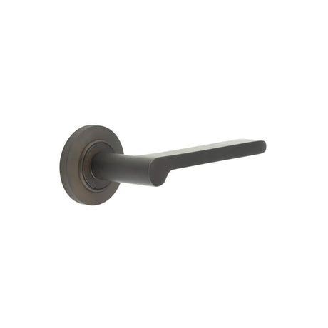 This is an image showing the Frelan - Fitzrovia Door Handles Chamfered Rose Dark Bronze available to order from Trade Door Handles in Kendal