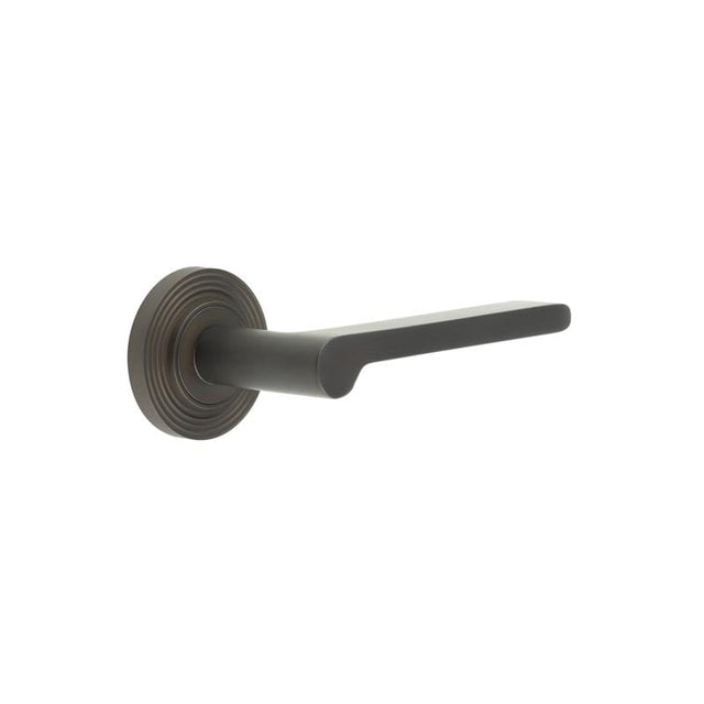 This is an image showing the Frelan - Fitzrovia Door Handles Reeded Rose Dark Bronze available to order from Trade Door Handles in Kendal