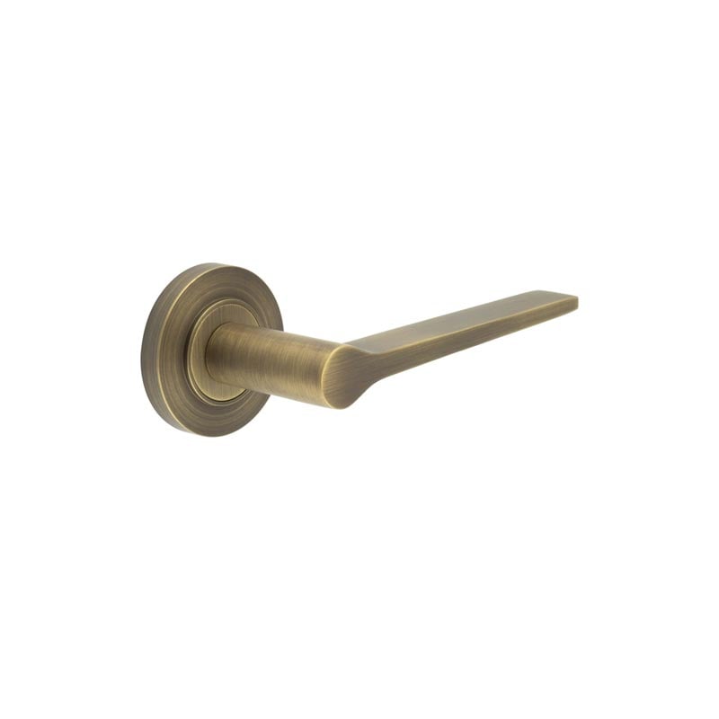 This is an image showing the Frelan - Knightsbridge Door Handle on Plain Rose Antique Brass available to order from Trade Door Handles in Kendal