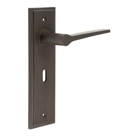 This is an image showing the Frelan - Knightbridge Door Handle Lock Backplate Dark Bronze available to order from Trade Door Handles in Kendal