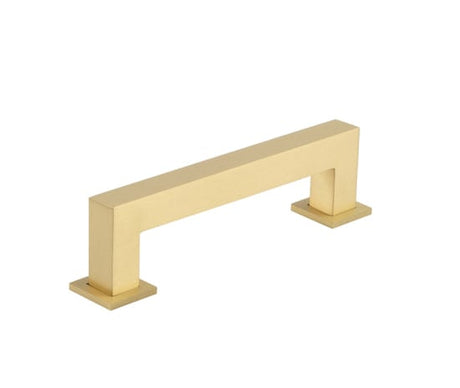 This is an image showing the Burlington - Trafalgar Cabinet Handle 128mm CTC - Satin Brass available to order from Trade Door Handles in Kendal