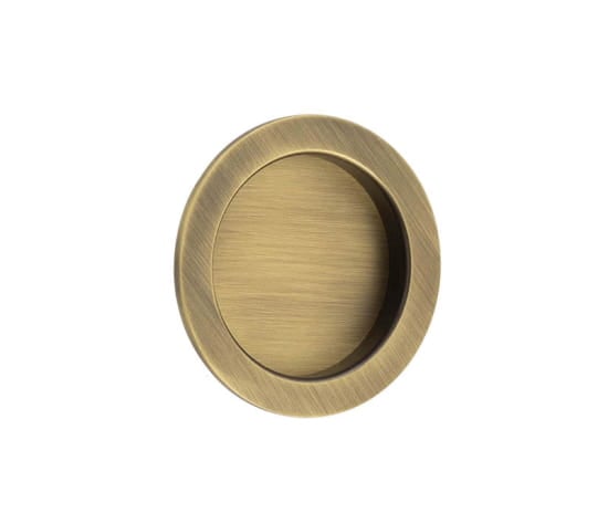 This is an image showing the Burlington - 65x12x3mm AB round concealed flush pull available to order from Trade Door Handles in Kendal