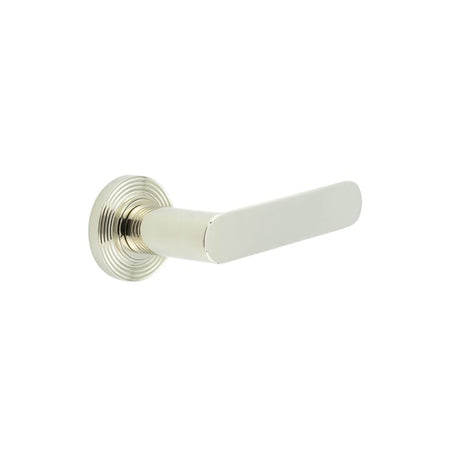 This is an image showing the Frelan - Kensington Door Handles Reeded Rose Polished Nickel available to order from Trade Door Handles in Kendal