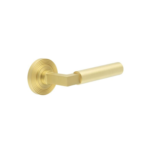 This is an image showing the Frelan - Westminster Door Handles Reeded Rose Satin Brass available to order from Trade Door Handles in Kendal