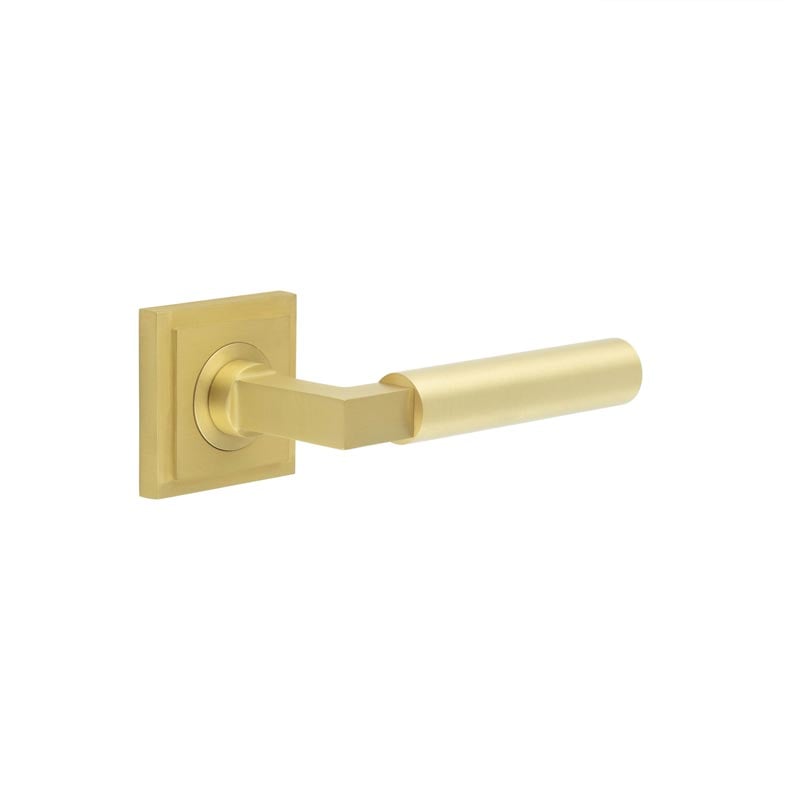 This is an image showing the Frelan - Westminster Door Handles Square Stepped Satin Brass available to order from Trade Door Handles in Kendal